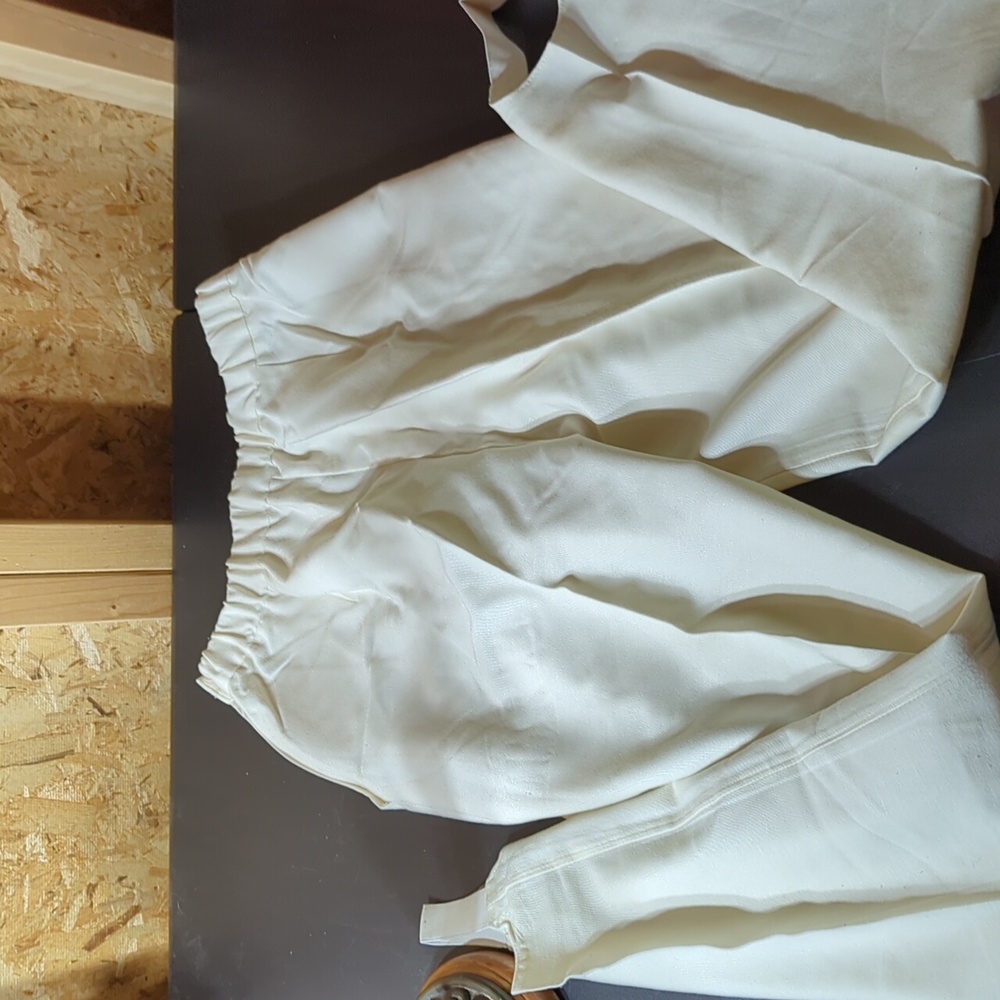 Suburban ladies size 10 white sturrip pants